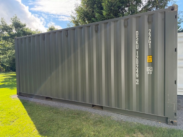 Twenty-foot shipping container on a lawn